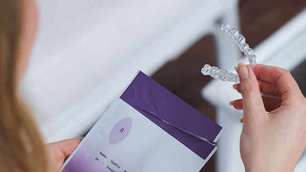 patient holding trioclear aligner